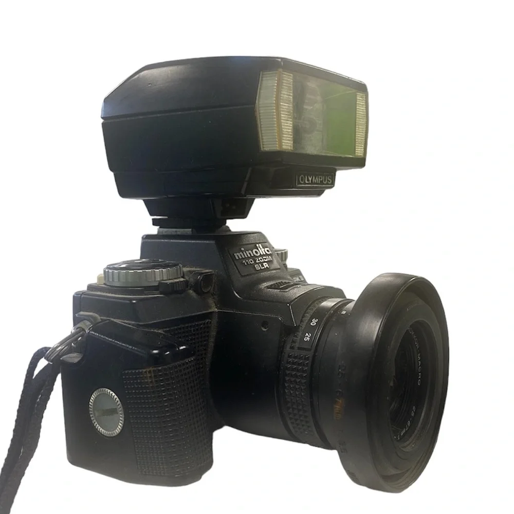 Vintage Minolta 110 Zoom SLR Film Camera 25-50mm f4.5 Lens